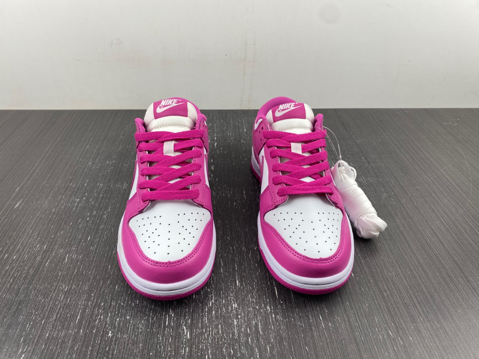 nike dunk low gs “active fuchsia” fj0704-100