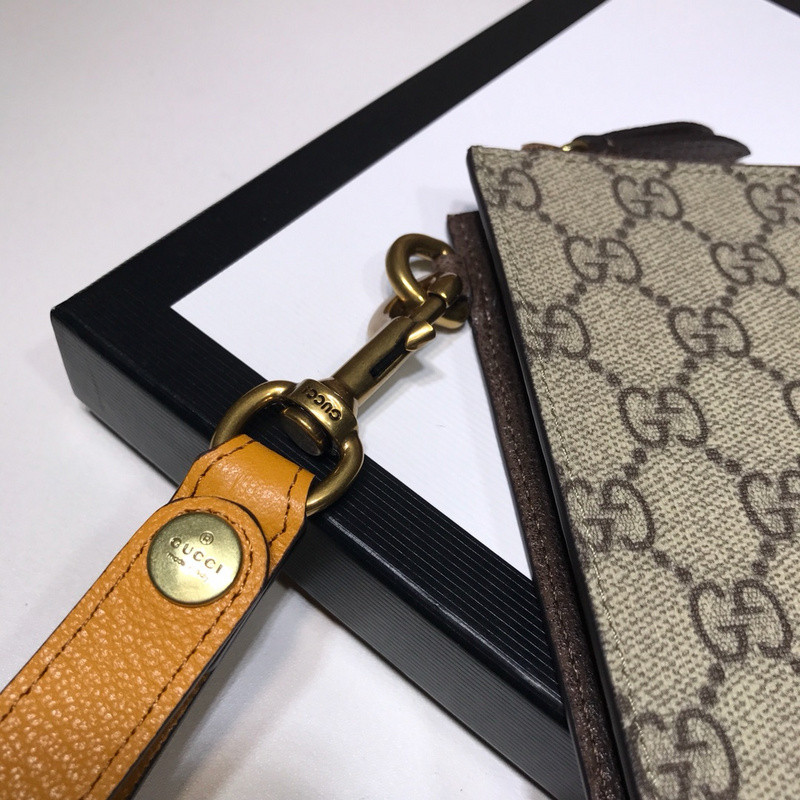 G*u*i clutch bag